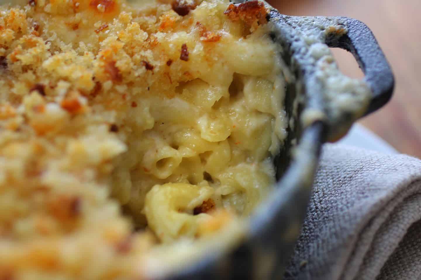 baked mac and cheese in a cast iron baking dish